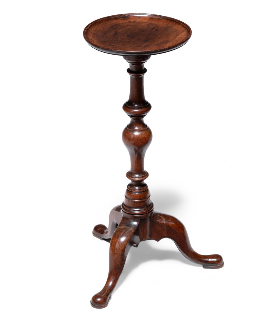 A GEORGE II MAHOGANY CANDLESTAND, CIRCA 1740 (1 of 3)
