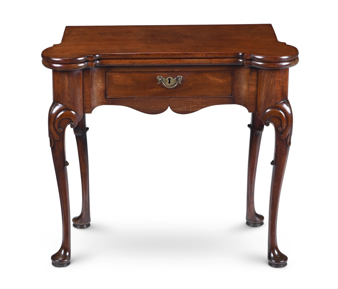 A GEORGE II MAHOGANY AND FIDDLEBACK MAHOGANY FOLDING TEA TABLE, CIRCA 1745 (1 of 5)