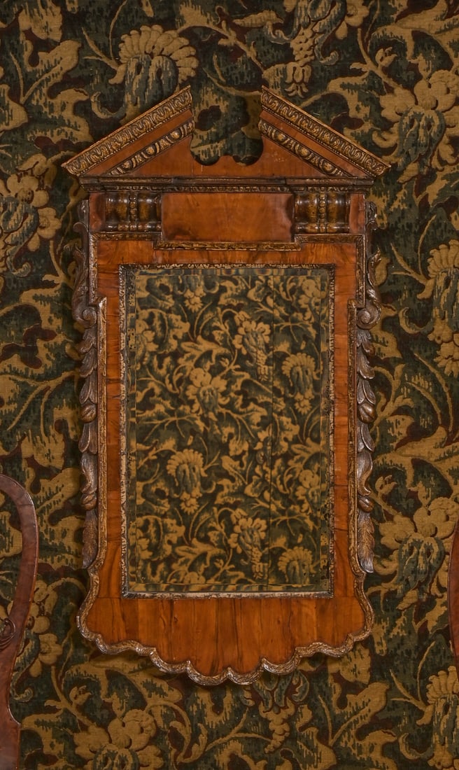 A GEORGE II WALNUT AND PARCEL GILT MIRROR, IN THE MANNER OF WILLIAM KENT, CIRCA 1740 (1 of 5)