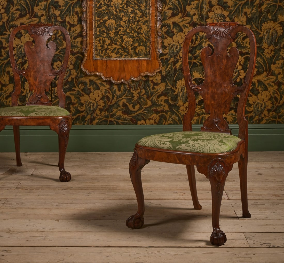 A PAIR OF GEORGE II WALNUT AND BURR WALNUT CHAIRS, IN THE MANNER OF GILES GRENDEY, CIRCA 1730: A PAIR OF GEORGE II WALNUT AND BURR WALNUT CHAIRSIN THE MANNER OF GILES GRENDEY, CIRCA 1730The underside of each chair stamped with journeyman's marks 'RW', with green damask style upholstered drop in
