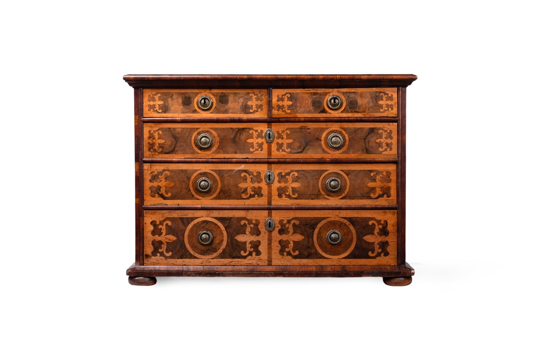 A CHARLES II OLIVEWOOD OYSTER, WALNUT, LABURNUM AND HOLLY INLAID CHEST OF DRAWERS, CIRCA 1680 (1 of 5)