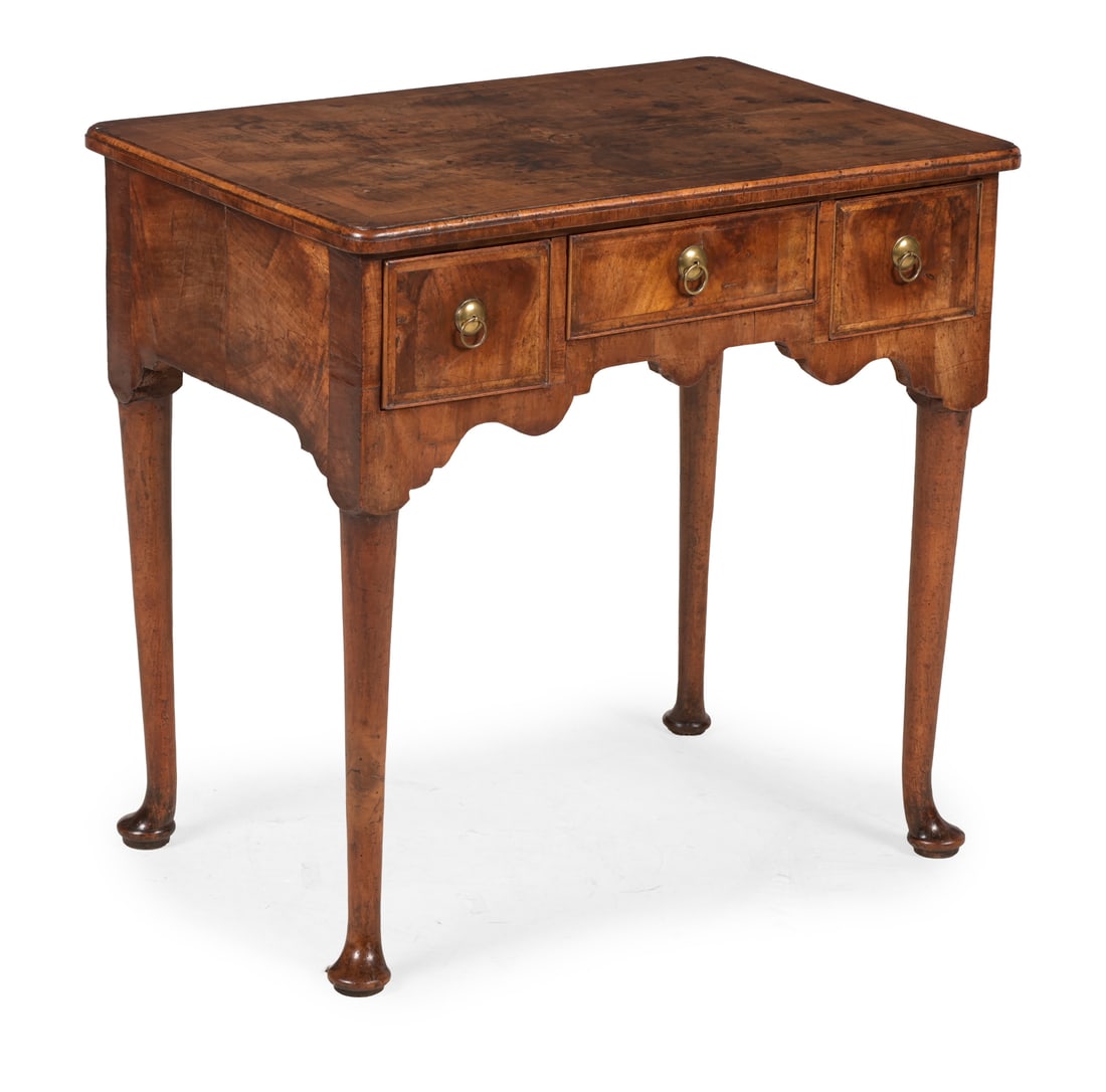 A GEORGE I WALNUT AND FEATHERBANDED SIDE TABLE OR LOWBOY, CIRCA 1720: A GEORGE I WALNUT AND FEATHERBANDED SIDE TABLE OR LOWBOYCIRCA 172074cm high, 99cm wide, 58cm deep