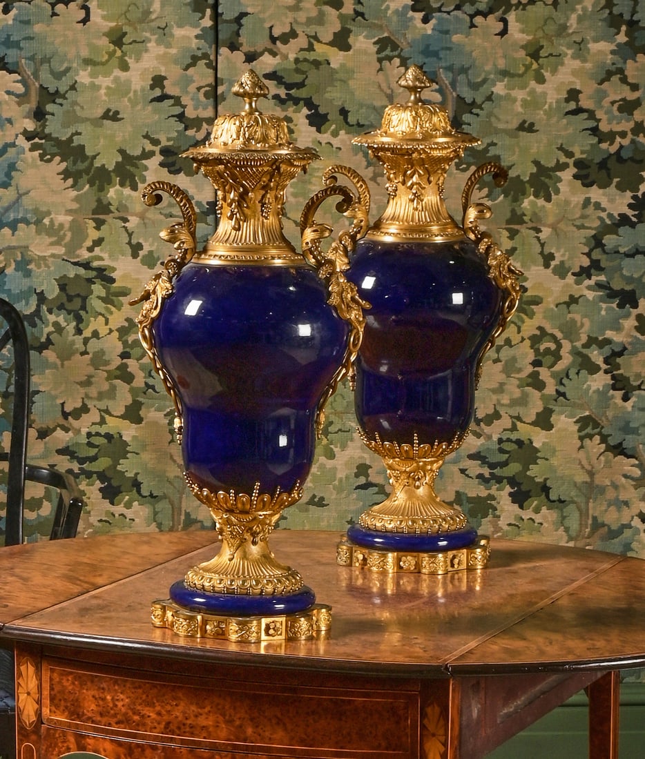 A PAIR OF FRENCH GILT METAL MOUNTED DEEP BLUE GLAZED PORCELAIN URNS AND COVERS, LATE 19TH CENTURY (1 of 4)