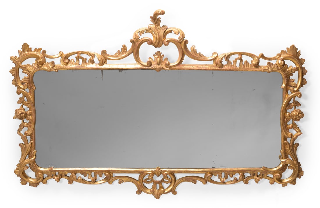 A GEORGE III CARVED GILTWOOD MIRROR, CIRCA 1770 (1 of 2)