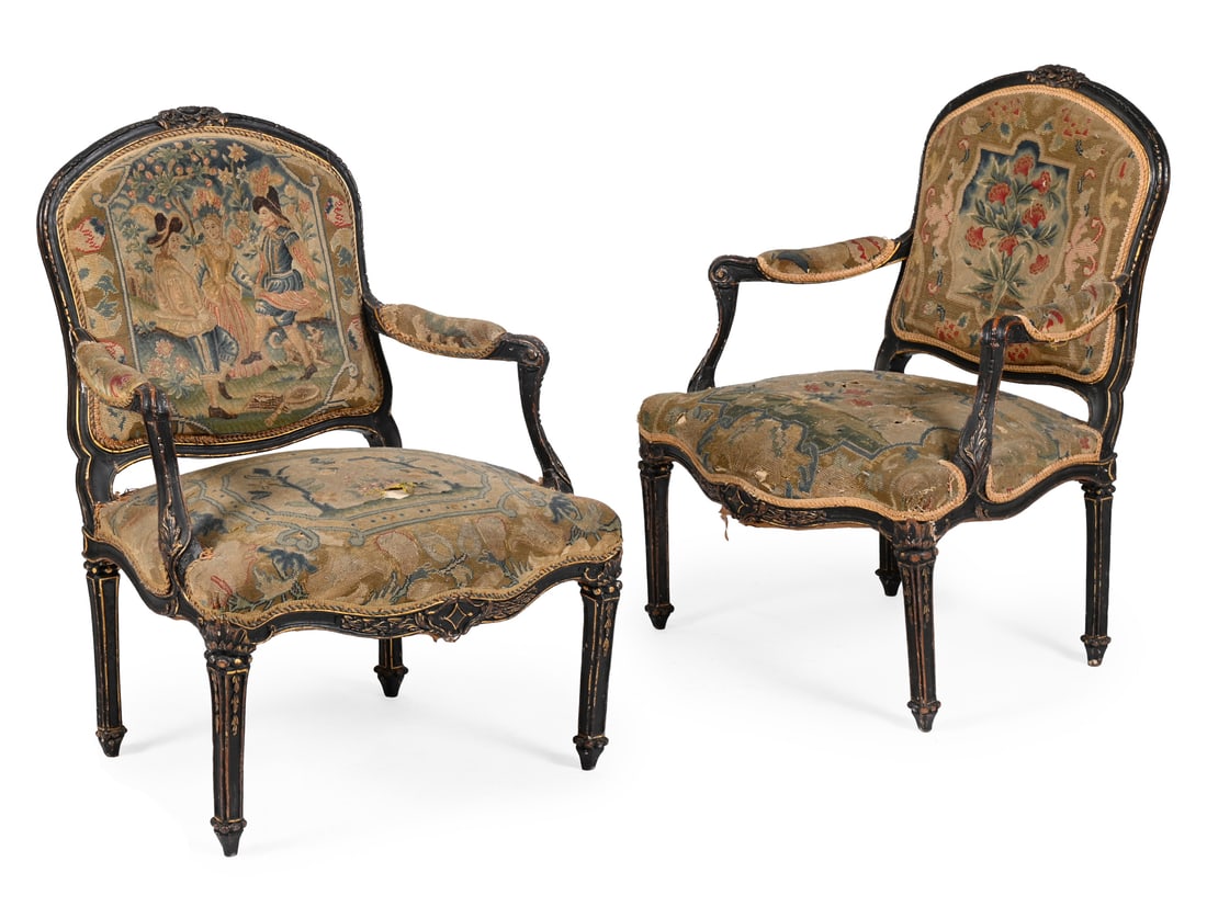 A PAIR OF LOUIS XVI EBONISED AND PARCEL GILT FAUTEUILS, LATE 18TH CENTURY: A PAIR OF LOUIS XVI EBONISED AND PARCEL GILT FAUTEUILS LATE 18TH CENTURYEach with needlework upholstery, the dust cover marked for Touzan Tapissier90cm high, 68cm wide, 55cm deep