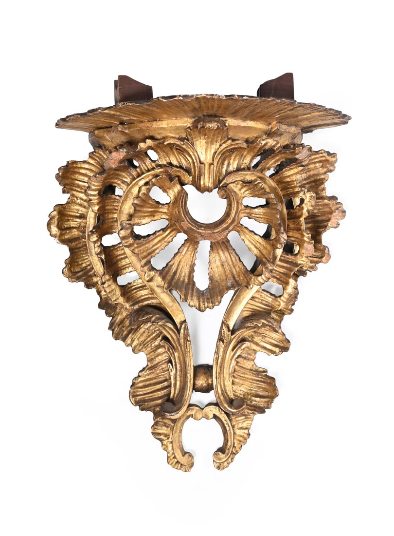 A GEORGE III CARVED GILTWOOD AND GESSO ROCOCO WALL BRACKET, CIRCA 1760: A GEORGE III CARVED GILTWOOD AND GESSO ROCOCO WALL BRACKETCIRCA 176041cm high, 30cm wide, 16cm deep