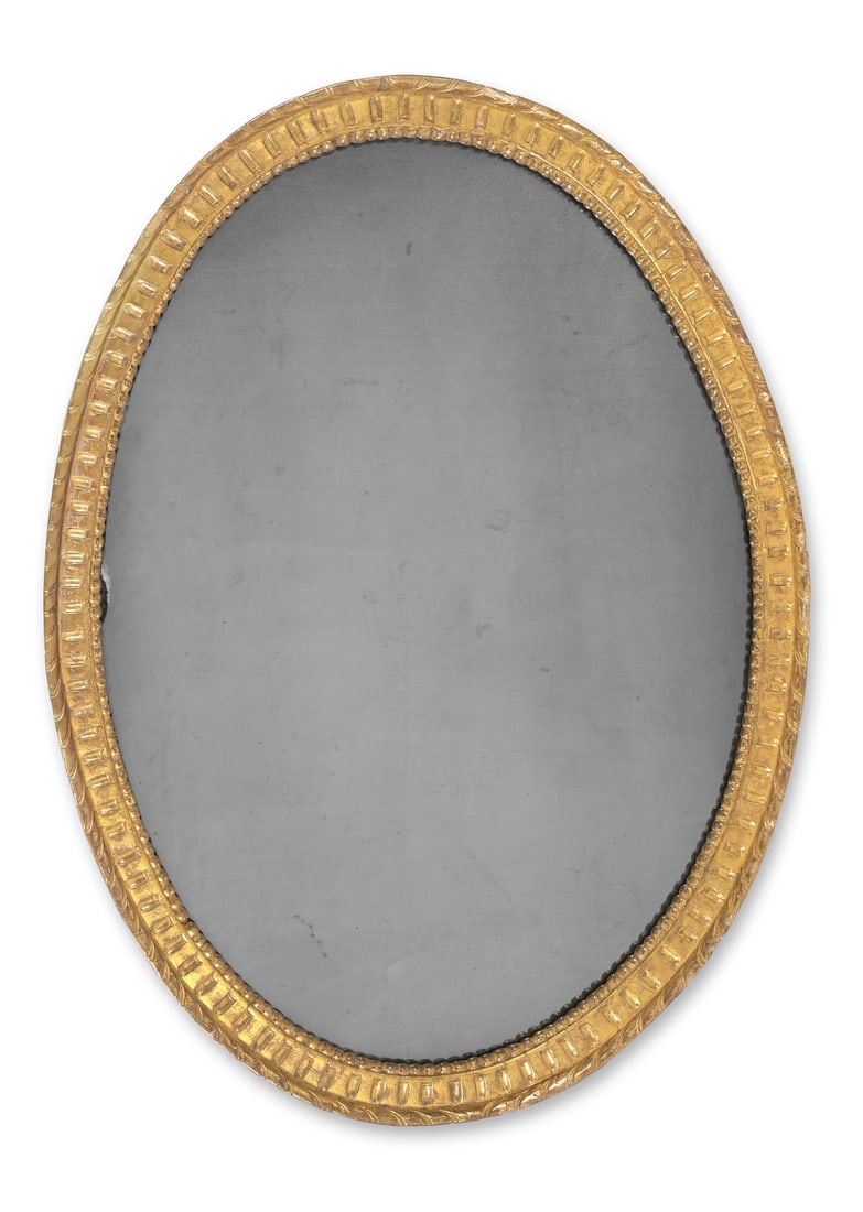 A GEORGE III CARVED GILTWOOD OVAL MIRROR, CIRCA 1810 (1 of 1)