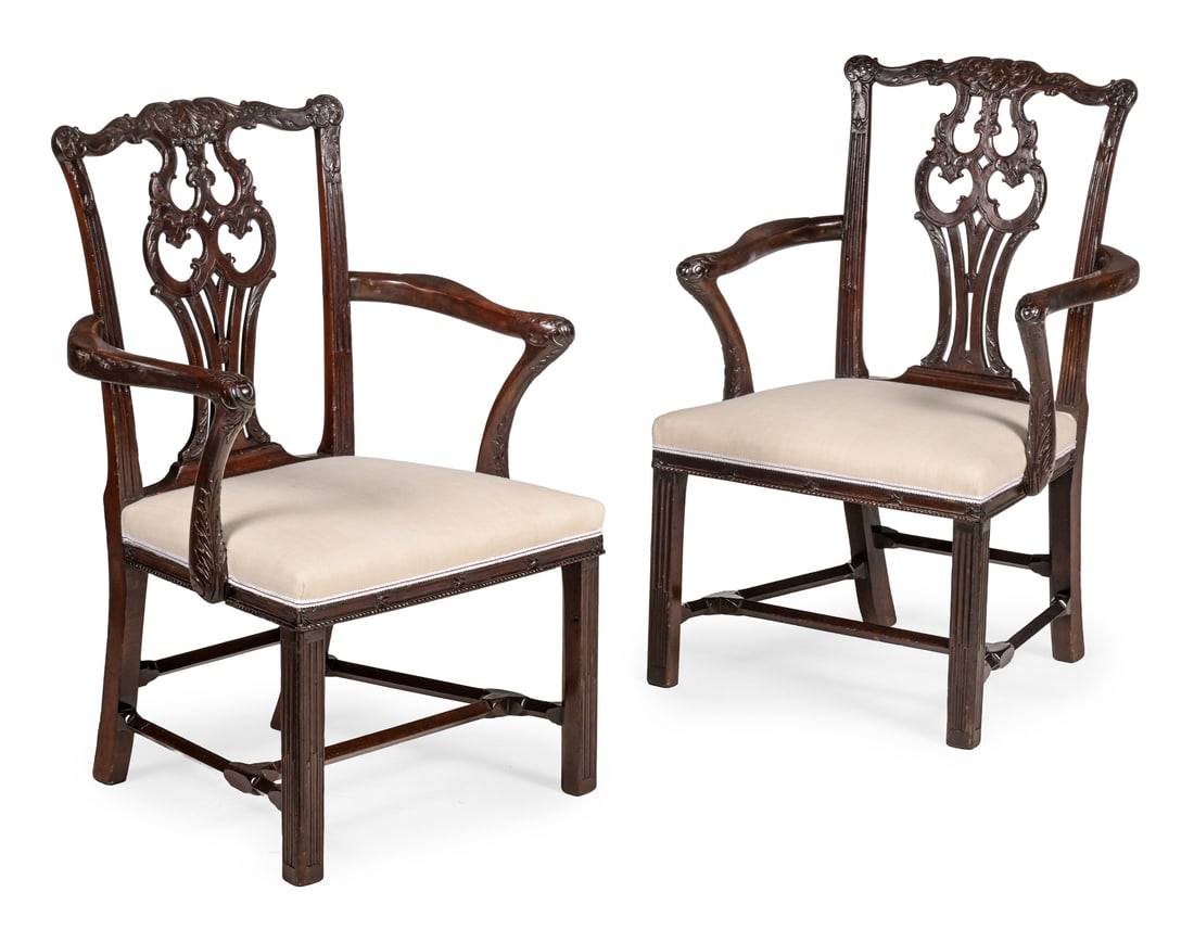 A PAIR OF GEORGE III CARVED MAHOGANY ARMCHAIRS, IN THE MANNER OF THOMAS CHIPPENDALE, CIRCA 1760 (1 of 4)