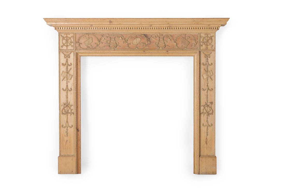 A CARVED PINE CHIMNEY PIECE OR FIRE SURROUND, LATE 18TH OR EARLY 19TH CENTURY AND LATER (1 of 3)