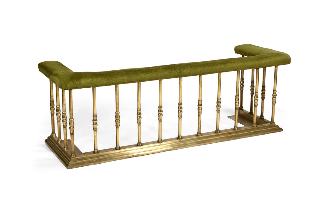 A VICTORIAN LACQUERED BRASS AND GREEN UPHOLSTERED CLUB FENDER, LATE 19TH CENTURY: A VICTORIAN LACQUERED BRASS AND GREEN UPHOLSTERED CLUB FENDERLATE 19TH CENTURYexternally 63cm high, 184cm wide, 60cm deepinternally at the base 160cm wide, 45cm deep