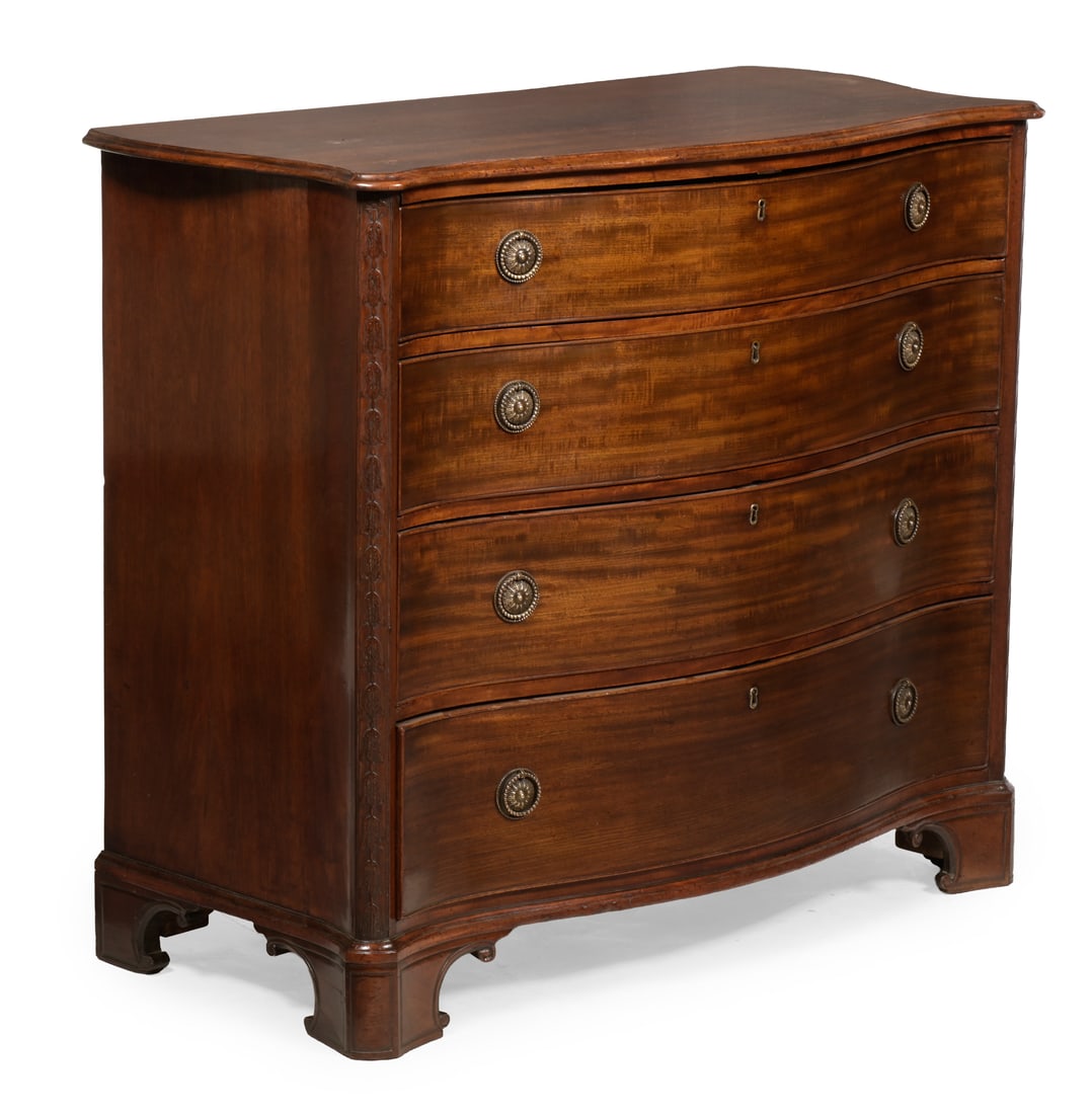 A GEORGE III MAHOGANY SERPENTINE COMMODE, CIRCA 1770 (1 of 3)