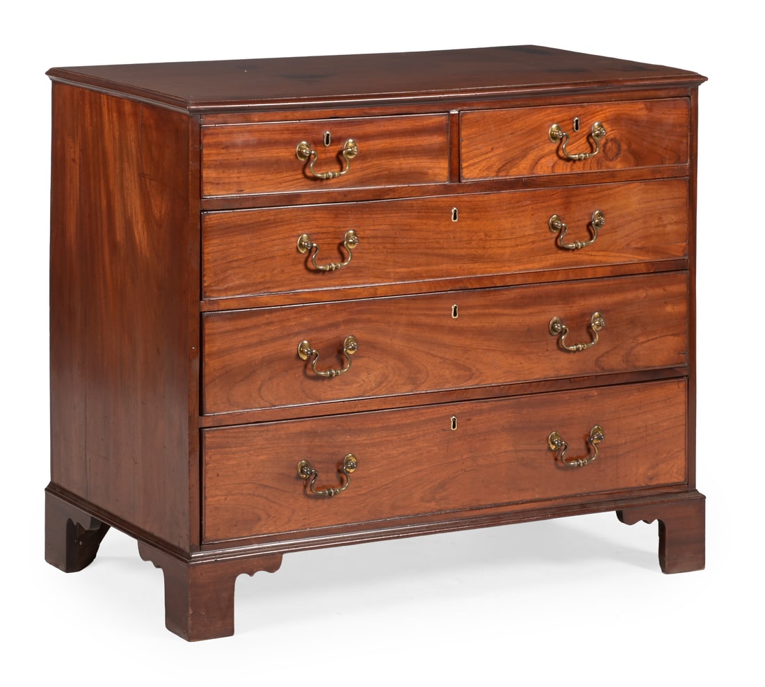 A GEORGE III MAHOGANY AND PADOUK CHEST OF DRAWERS, IN THE MANNER OF THOMAS CHIPPENDALE, CIRCA 1770 (1 of 2)