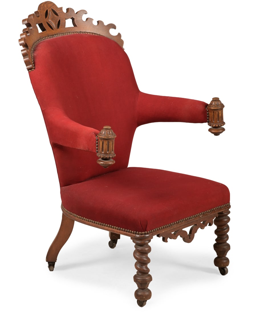 A VICTORIAN CARVED OAK, BRASS STUDDED AND UPHOLSTERED LIBRARY ARMCHAIR, CIRCA 1840 (1 of 3)