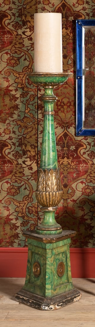 A LARGE CONTINENTAL SIMULATED MALACHITE AND PARCEL GILT WOOD TORCHERE, FIRST HALF 19TH CENTURY: A LARGE CONTINENTAL SIMULATED MALACHITE AND PARCEL GILT WOOD TORCHEREFIRST HALF 19TH CENTURYIn the Neo-Classical manner, with a large triple wick pillar candle the torchere 149cm high, 46cm wide