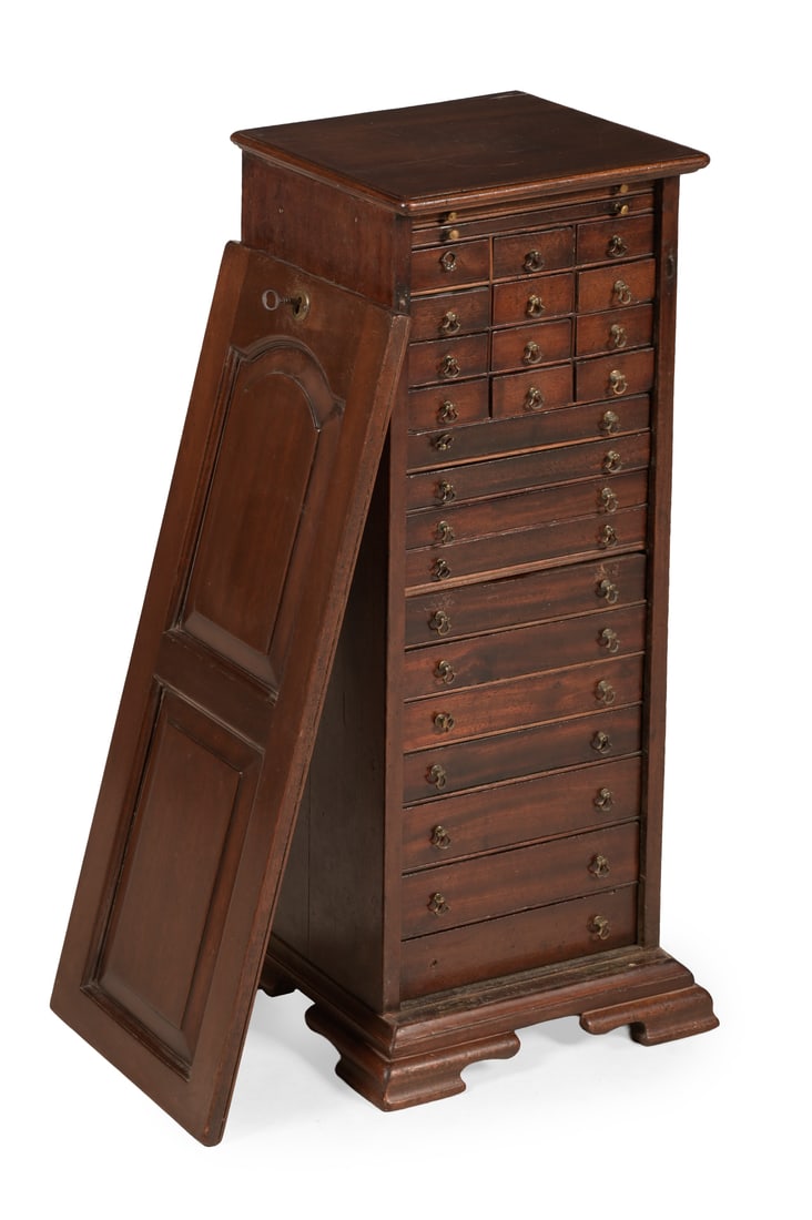 AN UNUSUAL GEORGE II MAHOGANY PEDESTAL COLLECTOR'S CABINET, CIRCA 1740 (1 of 4)