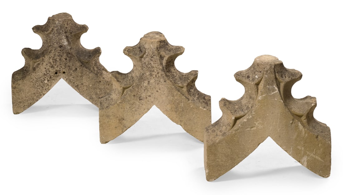 A GROUP OF THREE CARVED STONE GOTHIC ARCH ARCHITECTURAL ELEMENTS, 17TH CENTURY OR EARLIER: A GROUP OF THREE CARVED STONE GOTHIC ARCH ARCHITECTURAL ELEMENTS 17TH CENTURY OR EARLIER each approximately 54cm high
