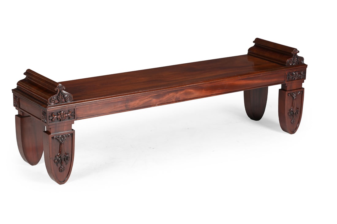 A GEORGE IV MAHOGANY HALL BENCH, IN THE MANNER OF CHARLES HEATHCOTE TATHAM, CIRCA 1825 (1 of 3)