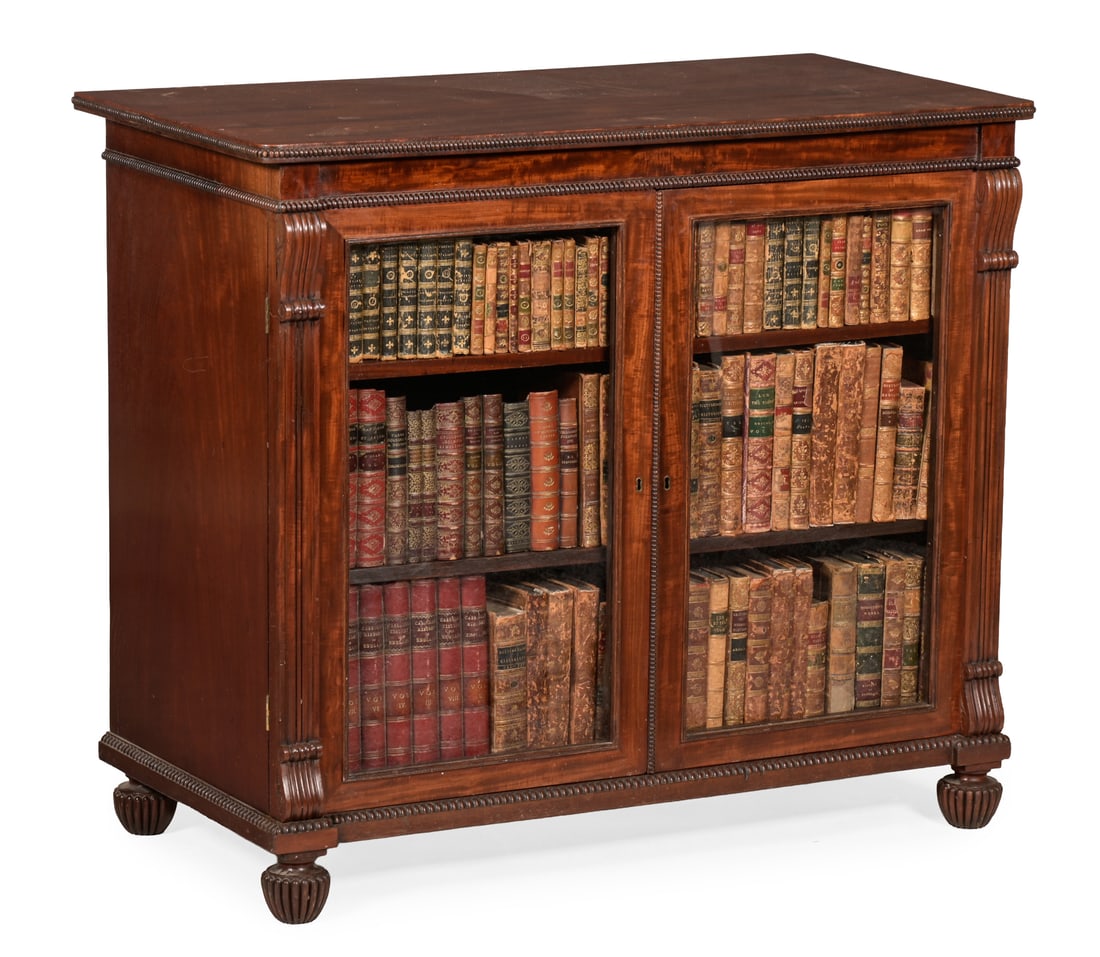 A REGENCY MAHOGANY BOOKCASE OR LIBRARY CABINET, ATTRIBUTED TO GILLOWS, CIRCA 1820 (1 of 3)