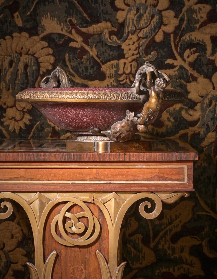 A GILT BRONZE MOUNTED IMPERIAL EGYPTIAN PORPHYRY TWIN-HANDLED LABRUM OR TAZZA : A GILT BRONZE MOUNTED IMPERIAL EGYPTIAN PORPHYRY TWIN-HANDLED LABRUM OR TAZZA THE PORPHYRYPROBABLY LATE 18TH OR EARLY 19TH CENTURY The handles each adorned with a puttoan