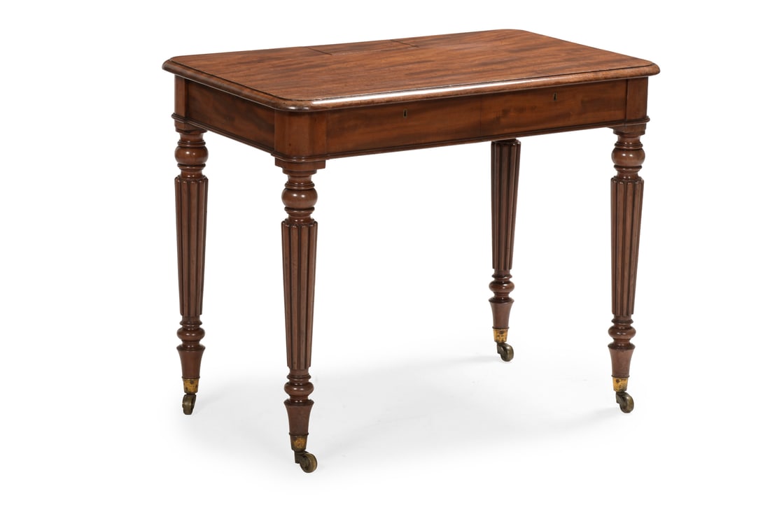 A REGENCY MAHOGANY CHAMBER TABLE, IN THE MANNER OF GILLOWS, CIRCA 1815: A REGENCY MAHOGANY CHAMBER TABLEIN THE MANNER OF GILLOWS, CIRCA 1815 The top with a small compartment opening to reveal a pen rest and two ink well sections, with two concealed frieze drawers, the tab