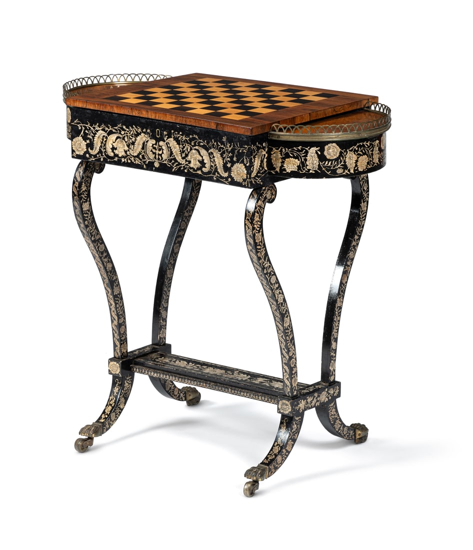 Y A REGENCY ROSEWOOD, PENWORK DECORATED AND PAINTED GAMES TABLE, CIRCA 1815: Y A REGENCY ROSEWOOD, PENWORK DECORATED AND PAINTED GAMES TABLECIRCA 1815The hinged top and sides all opening to lined storage74cm high, 75cm wide, 41.5cm deep ϒ Indicates that this lot may be su