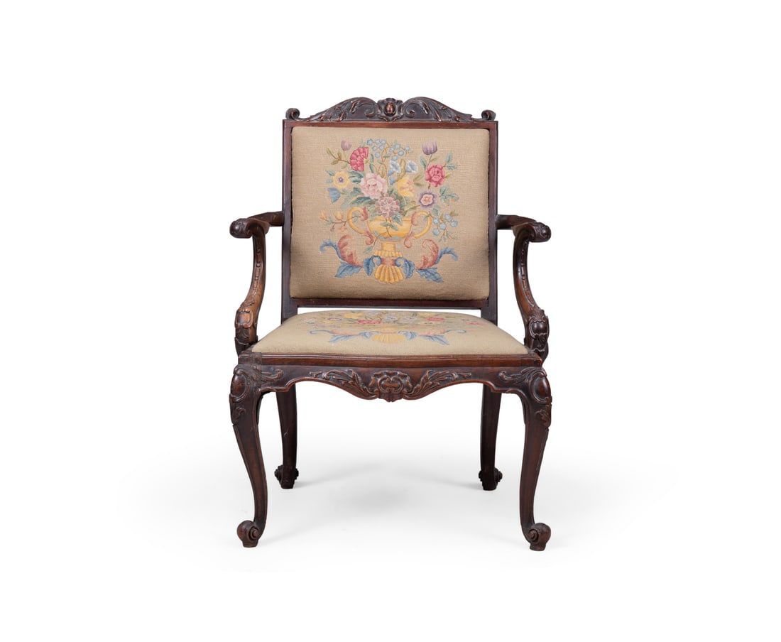 A GEORGE II CARVED MAHOGANY AND NEEDLEWORK UPHOLSTERED OPEN ARMCHAIR, CIRCA 1750 (1 of 3)