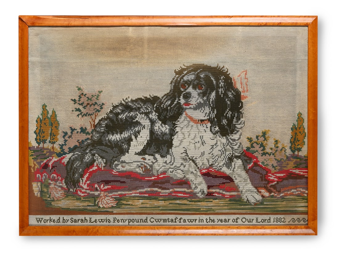 A LARGE VICTORIAN WELSH NEEDLEWORK PICTURE OF A SPANIEL, WORKED BY SARAH LEWIS IN 1882: A LARGE VICTORIAN WELSH NEEDLEWORK PICTURE OF A SPANIEL WORKED BY SARAH LEWIS IN 1882 Inscribed to lower margin 'Worked by Sarah Lewis Pen-Y-Pound, Cwm-Fawr in the year of our Lord 1882', in a glazed 