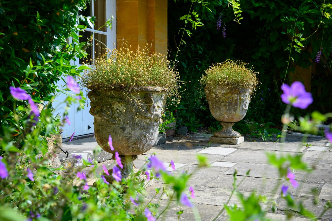 A PAIR OF VICTORIAN CARVED SANDSTONE URN PLANTERS, SCOTTISH, CIRCA 1850 (1 of 3)