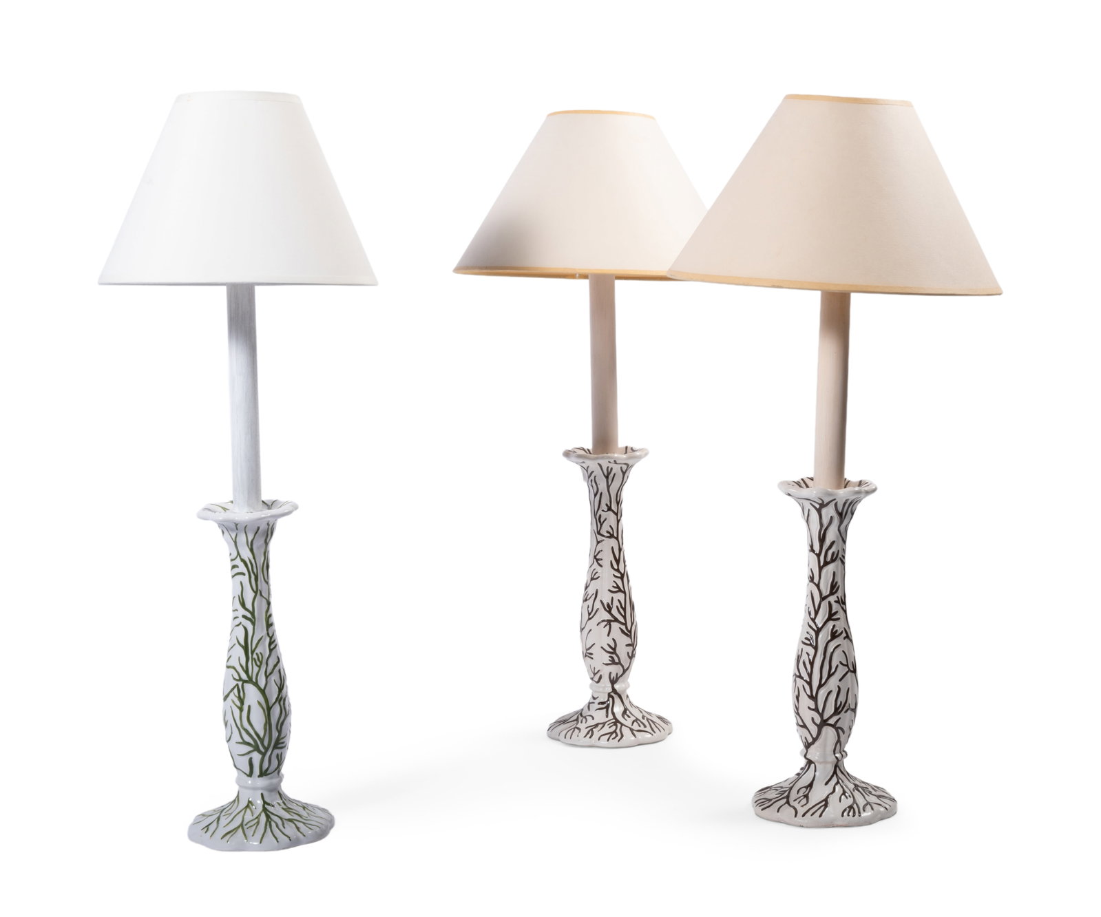 THREE PAINTED SEAWEED CERAMIC TABLE LAMPS, BY SIBYL COLEFAX & JOHN FOWLER, LATE 20TH CENTURY: A PAIR OF BROWN PAINTED SEAWEED CERAMIC TABLE LAMPS BY SIBYL COLEFAX & JOHN FOWLER, LATE 20TH CENTURY Fitted for electricity, with card shades 60cm high overall Together with a green painted