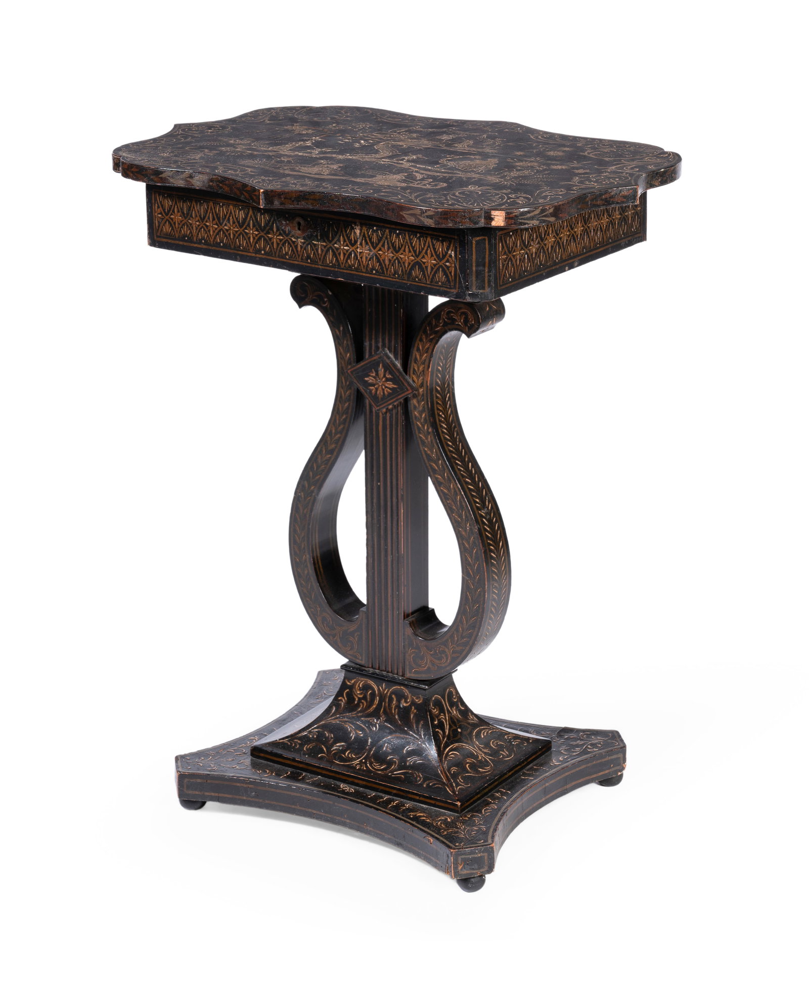 A NAPOLEAN III FLORAL PAINTED AND EBONISED SEWING TABLE, MID 19TH CENTURY: A NAPOLEAN III FLORAL PAINTED AND EBONISED SEWING TABLE MID 19TH CENTURY The hinged top enclosing a fitted interior, on a lyre support and spreading platform base, with paper label ‘This lyre