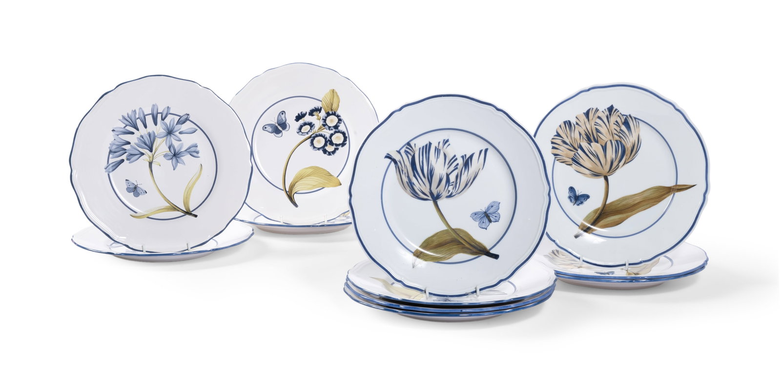 TWO HAND PAINTED BOWLS DECORATED BY GEORGE OAKES FOR COLEFAX & FOWLER, AND NINE SIMILAR EXAMPLES: TWO HAND PAINTED BOWLS DECORATED WITH A PLANT SPECIMEN BY GEORGE OAKES FOR COLEFAX & FOWLER, LATE 20TH CENTURY One marked verso ‘A hand painted Colefax & Fowler design’ 28cm