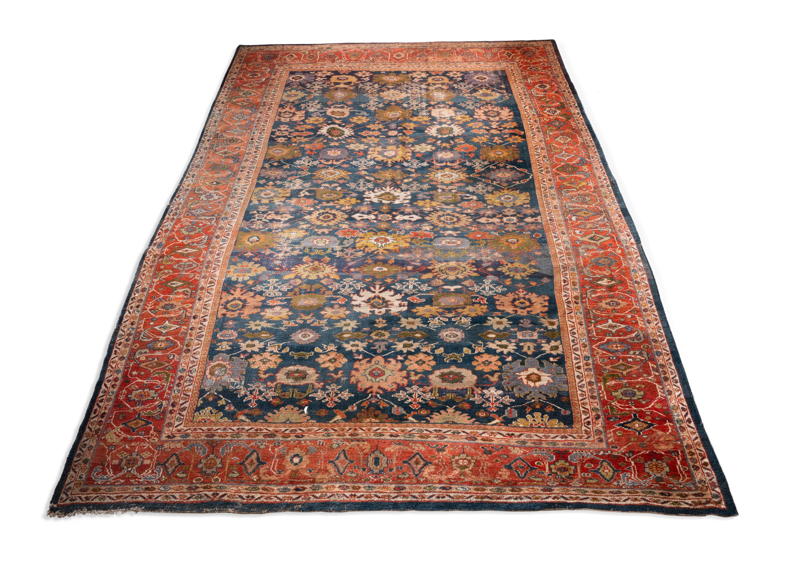 A LARGE MAHAL (SULTANABAD) BLUE GROUND CARPET: A LARGE MAHAL (SULTANABAD) BLUE GROUND CARPET approximately 468 x 343cm Condition Report: Wear overall commensurate with age and use Short pile and wear overall, particularly to central field Weft is