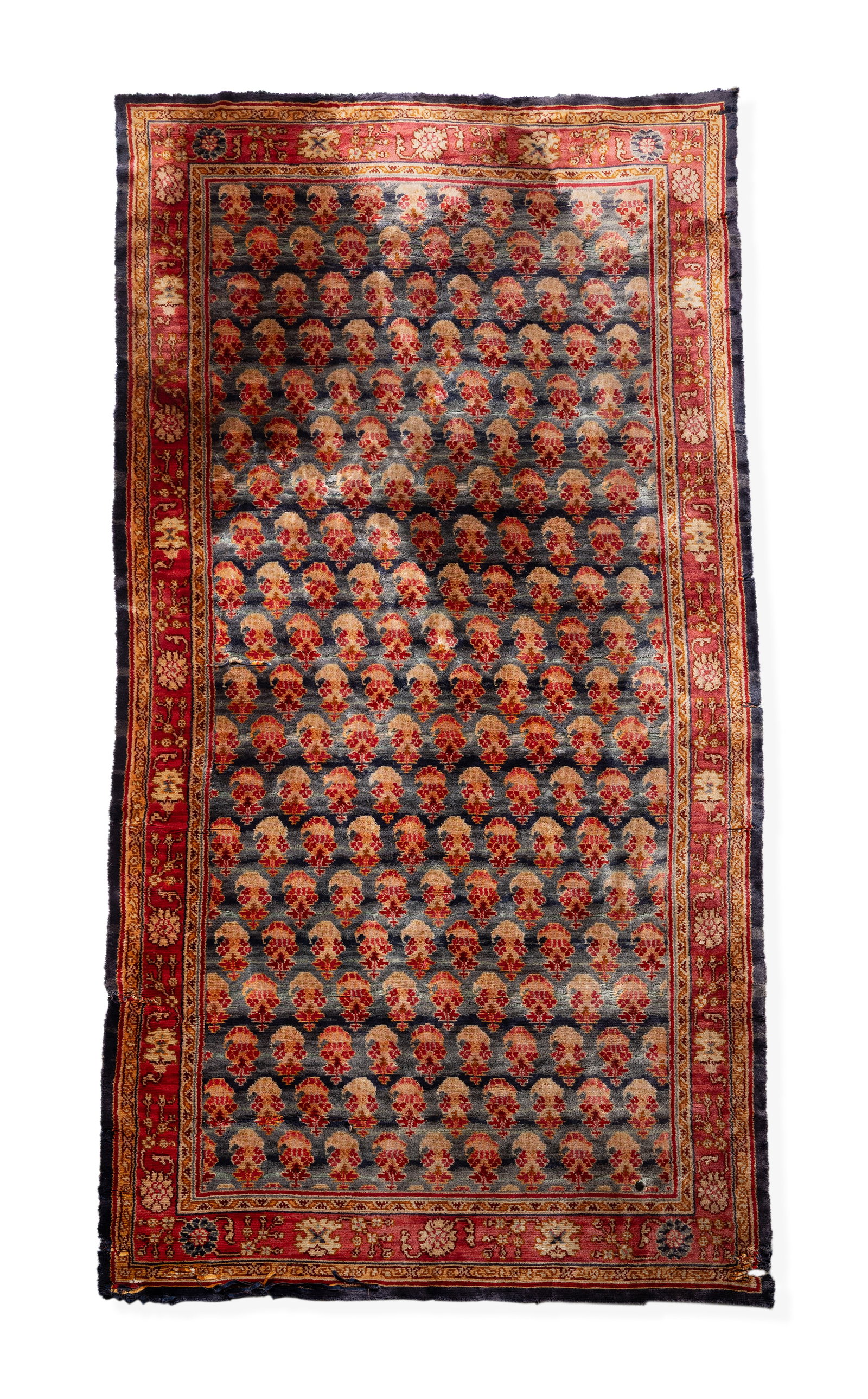 A BELGIAN CHENILLE CARPET: A BELGIAN CHENILLE CARPET approximately 292 x 153cm Condition Report: Wear overall commensurate with age and use The carpet is very fragile, already possessing numerous rips and tears that are likely