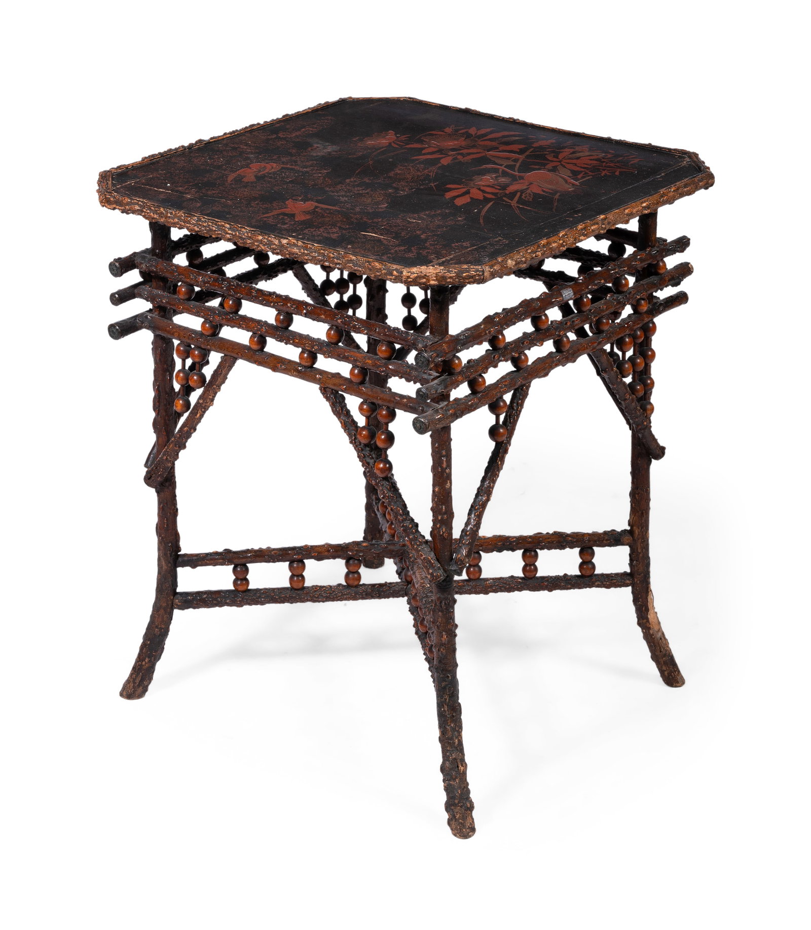 A LATE VICTORIAN AESTHETIC MOVEMENT JAPANESE LACQUER TOPPED TABLE, LATE 19TH CENTURY: A LATE VICTORIAN AESTHETIC MOVEMENT JAPANESE LACQUER TOPPED TABLE LATE 19TH CENTURY On a black thorn rustic base, the legs joined by stretchers 67cm high, 56.5cm wide Condition Report Disclaimer