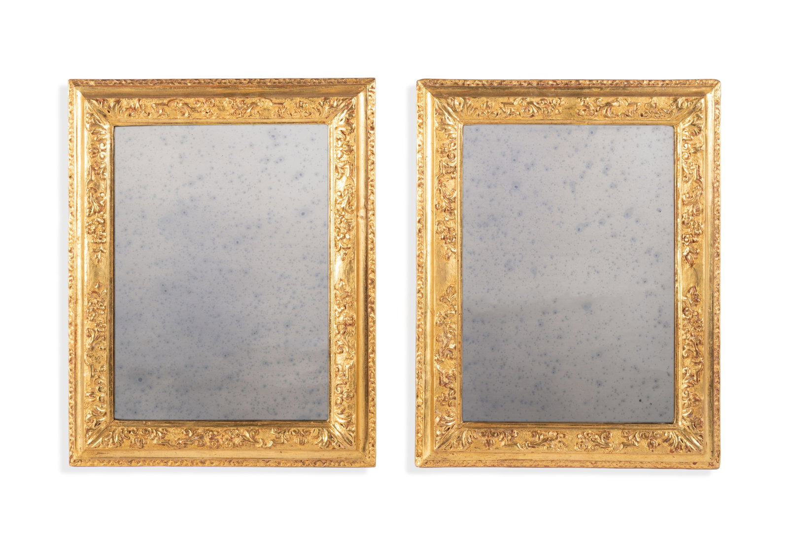 A PAIR OF GILTWOOD MIRRORS OF GEORGE III STYLE: A PAIR OF GILTWOOD MIRRORS OF GEORGE III STYLE The mirror plates later added by George Oakes 43 x 33cm Provenance: A gift from John Fowler, The Hunting Lodge, Hampshire Condition Report