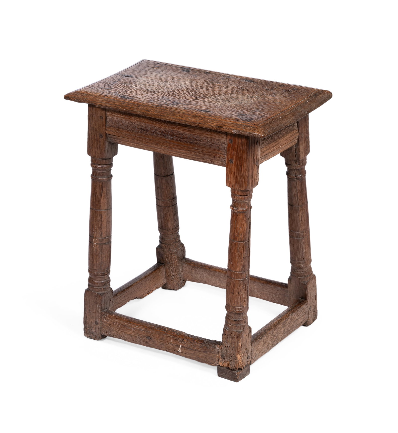 AN OAK JOINED STOOL, ENGLISH, LATE 17TH CENTURY: AN OAK JOINED STOOL ENGLISH, LATE 17TH CENTURY With paper label 'This stool was left to me in his will by the late John Fowler, C.B.E.' 54cm high, 39cm wide, 28cm deep Provenance: A gift from