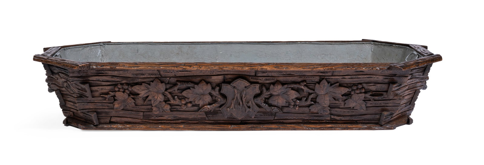 A BLACK FOREST LINDEN WOOD WINE COOLER OR JARDINIERE, LATE 19TH CENTURY: A BLACK FOREST LINDEN WOOD WINE COOLER OR JARDINIERE LATE 19TH CENTURY 20cm high, 111cm wide, 52cm deep Provenance: Woolley & Wallis, Furniture, Works of Art & Clocks, 22 September 2021, lot