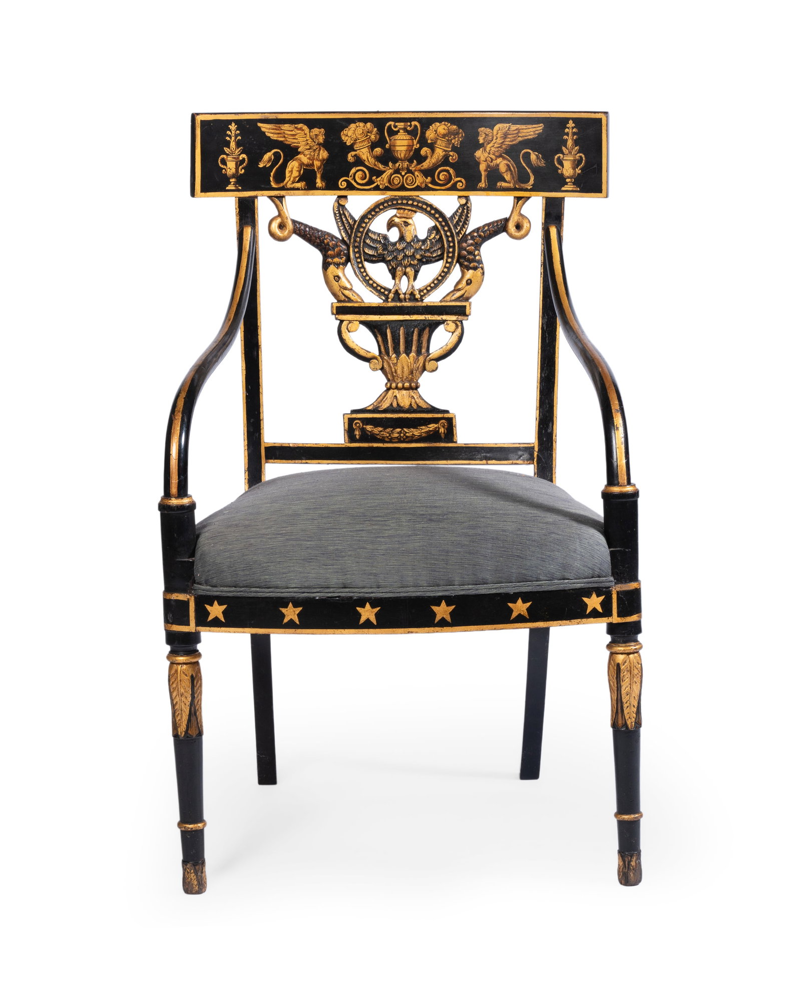 A REGENCY EBONISED AND PARCEL GILT ARMCHAIR, EARLY 19TH CENTURY: A REGENCY EBONISED AND PARCEL GILT ARMCHAIR EARLY 19TH CENTURY 91cm high, 58cm wide, 56cm deep Provenance: Lyon & Turnbull, Five Centuries, 18 May 2022, lot 214 Condition Report: PLEASE NOTE: ALL