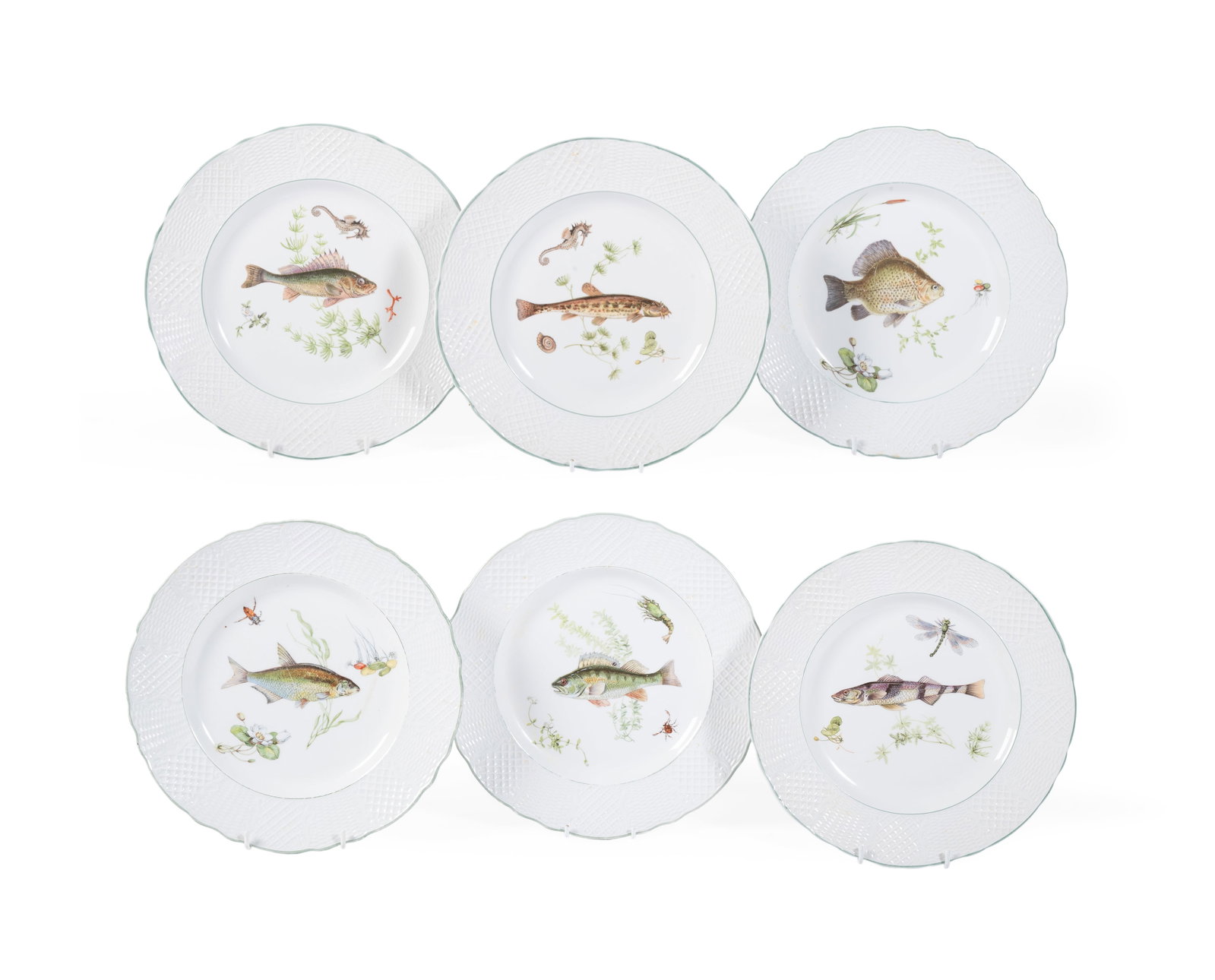 SIX SIMPSON'S (POTTERS) LTD MARLBOROUGH OLD ENGLISH IRONSTONE FISH PLATES, LATE 19TH CENTURY: SIX SIMPSON'S (POTTERS) LTD MARLBOROUGH OLD ENGLISH IRONSTONE FISH PLATES LATE 19TH CENTURY Printed and painted with fish within ozier moulded borders each 26.5cm diameter Condition Report: With