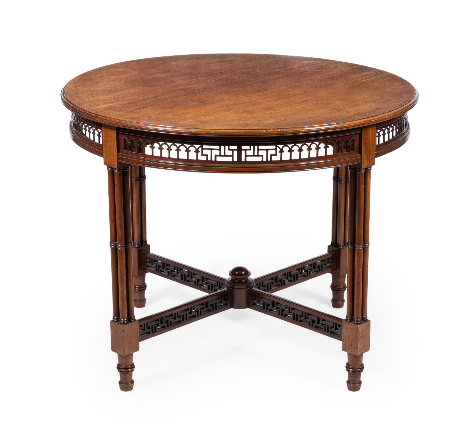 AN EDWARDIAN MAHOGANY CIRCULAR TABLE, EARLY 20TH CENTURY: AN EDWARDIAN MAHOGANY CIRCULAR TABLE EARLY 20TH CENTURY With pierced fret carved frieze on cluster column legs joined by stretchers 72cm high, 93cm diameter Condition Report Disclaimer
