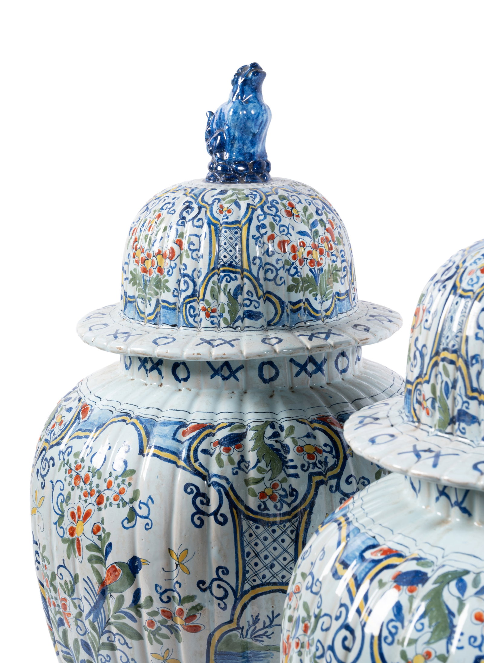 A PAIR OF DUTCH DELFT POLYCHROME VASES AND DOMED COVERS, IN 18TH CENTURY STYLE, CIRCA 1900 - 2