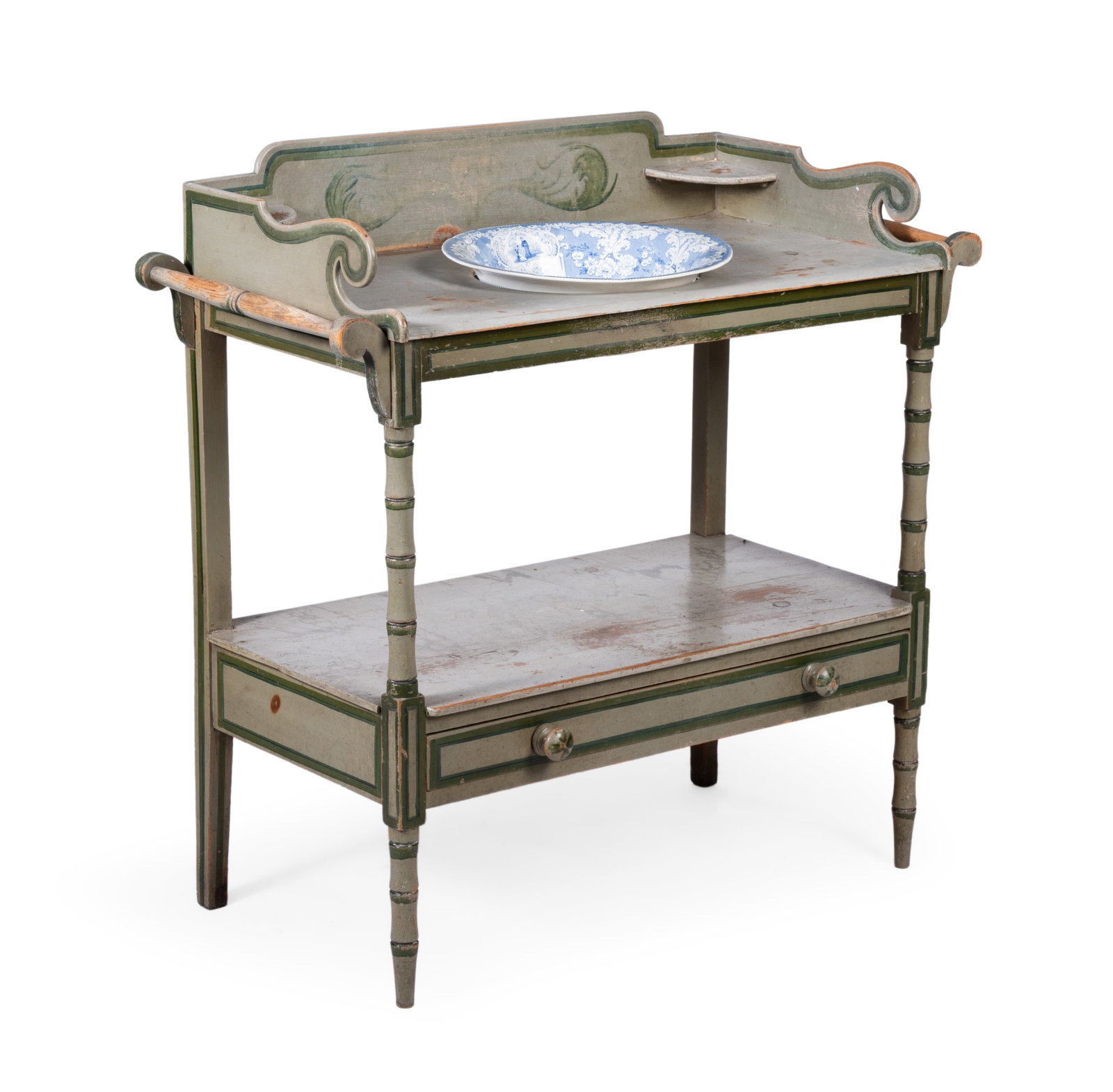 AN EARLY VICTORIAN GREEN PAINTED WASHSTAND, MID 19TH CENTURY: AN EARLY VICTORIAN GREEN PAINTED WASHSTAND MID 19TH CENTURY With a three quarter gallery and blue and white porcelain wash bowl above an undertier 187cm high, 89cm wide, 42cm deep Condition Report: