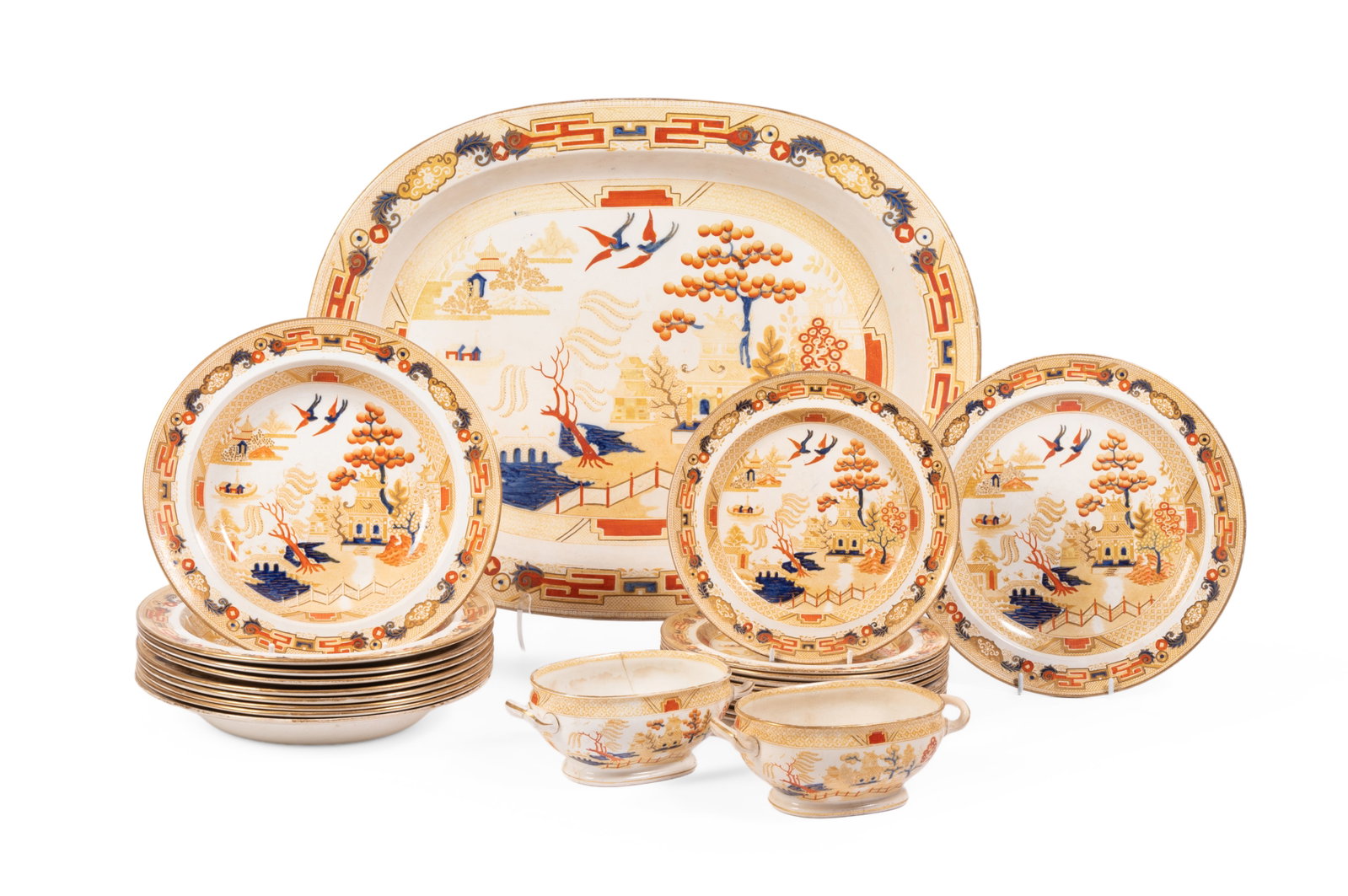A WEDGWOOD WILLOW PATTERN PART DINNER SERVICE, CIRCA 1880: A WEDGWOOD WILLOW PATTERN PART DINNER SERVICE CIRCA 1880 Including; a large serving dish, 40cm, wide, 52cm long, two sauce tureens,18cm wide, nine soup plates, 25cm diameter, ten breakfast plates,