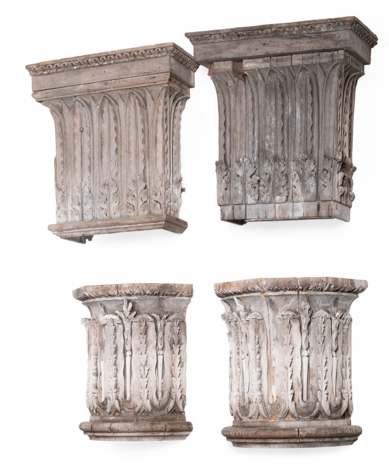A GROUP OF FOUR CARVED SOFTWOOD CAPITALS, LATE 18TH OR EARLY 19TH CENTURY, AND FOUR FURTHER EXAMPLES (1 of 3)