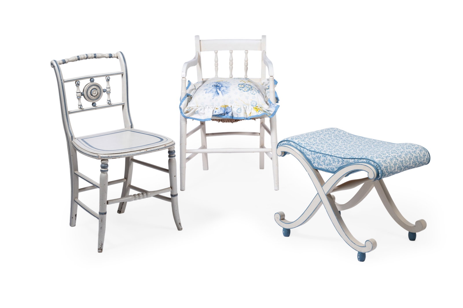 AN X FRAME STOOL BY SIBYL COLEFAX & JOHN FOWLER, 20TH CENTURY, TOGETHER WITH TWO PAINTED CHAIRS: AN X FRAME STOOL BY SIBYL COLEFAX & JOHN FOWLER, SECOND HALF 20TH CENTURY In white with blue line details, the seat upholstered in Sibyl Colefax & John Fowler 'Oak Twig' fabric 45cm high,