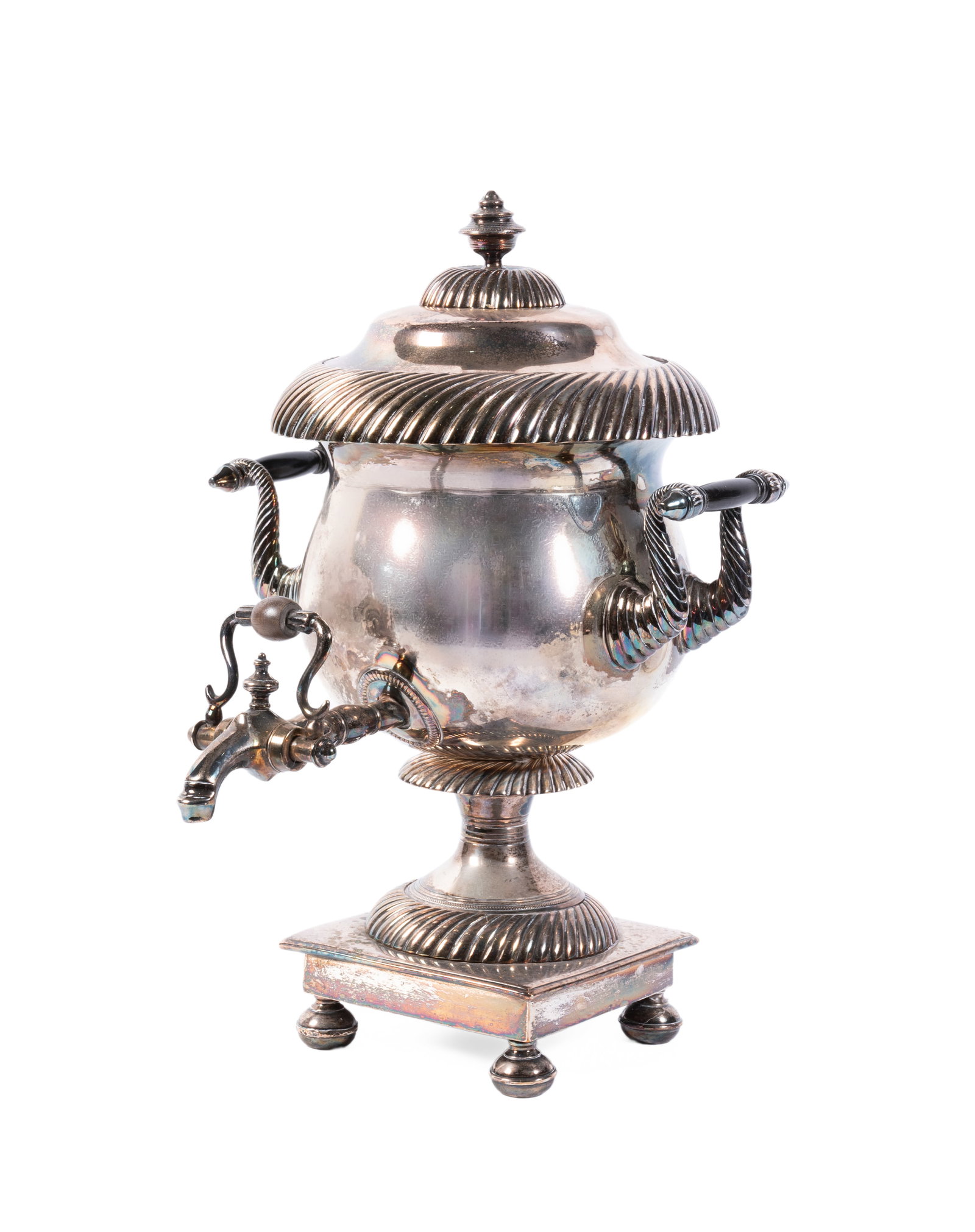 AN OLD SHEFFIELD PLATE SAMOVAR, UNMARKED: AN OLD SHEFFIELD PLATE SAMOVAR UNMARKED With urn shaped finial to the gadrooned ogee domed cover, the body with scrolled and wood handles, to a square base on four compressed ball feet 36cm high