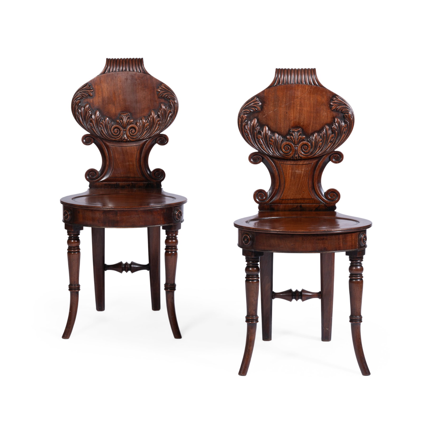 A PAIR OF REGENCY MAHOGANY HALL CHAIRS, CIRCA 1815 (1 of 3)