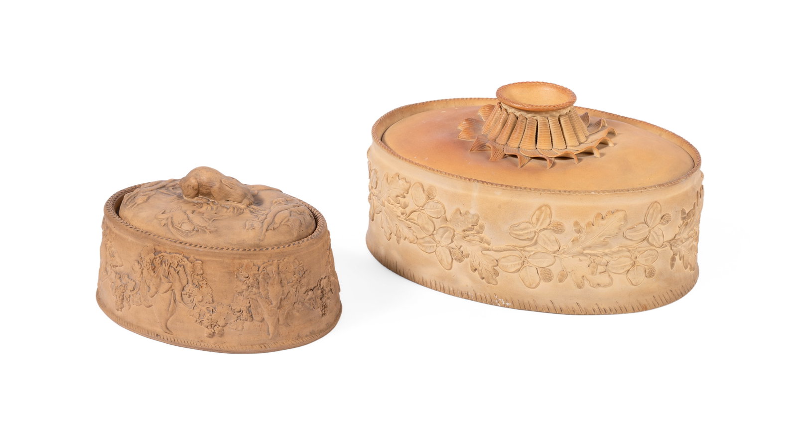 A WEDGWOOD CANEWARE GAME PIE TUREEN AND COVER, CIRCA 1880, TOGETHER WITH A STAFFORDSHIRE EXAMPLE: A WEDGWOOD CANEWARE OVAL GAME PIE TUREEN AND COVER CIRCA 1880 Moulded in relief with trophies of game and the cover with rabbit finial 13cm high, 25cm long Together with a larger Staffordshire
