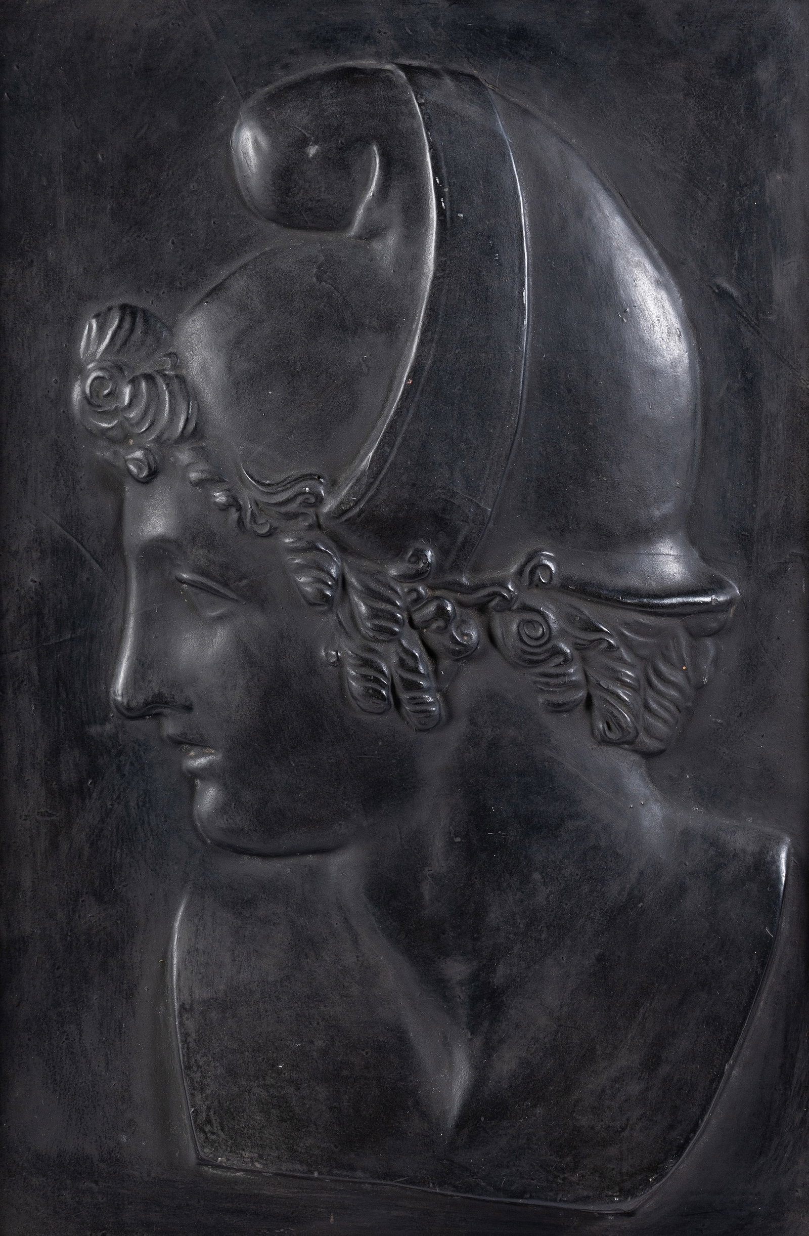 A BLACK PAINTED COMPOSITION RELIEF OF A MAN, 20TH CENTURY - 2