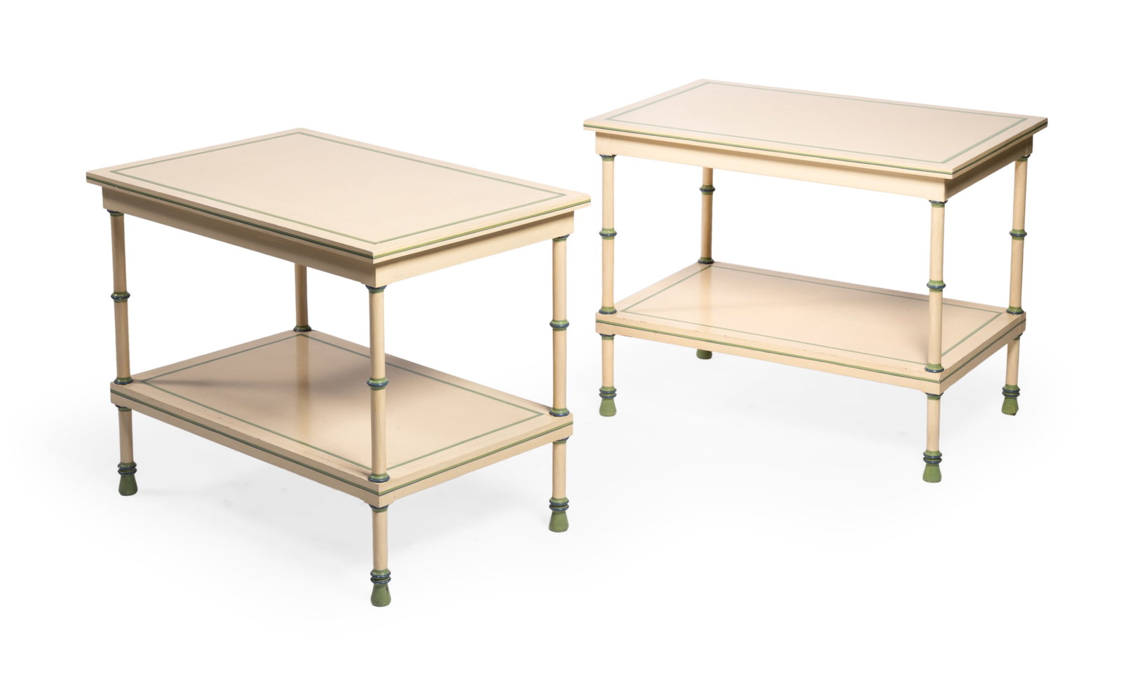 A PAIR OF CREAM AND GREEN PAINTED TWO TIER TABLES, BY SIBYL COLEFAX & JOHN FOWLER, 20TH CENTURY: A PAIR OF CREAM AND GREEN LINE PAINTED TWO TIER TABLES BY SIBYL COLEFAX & JOHN FOWLER, LATE 20TH CENTURY 58cm high, 70cm wide, 46cm deep Condition Report: With wear, marks, knocks and